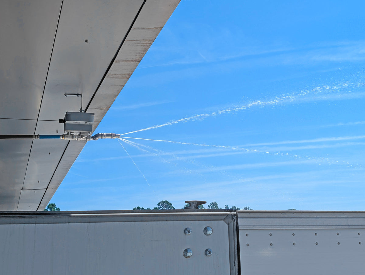 Roof cooling, evaporative spray system for truck trailer cooling solution.