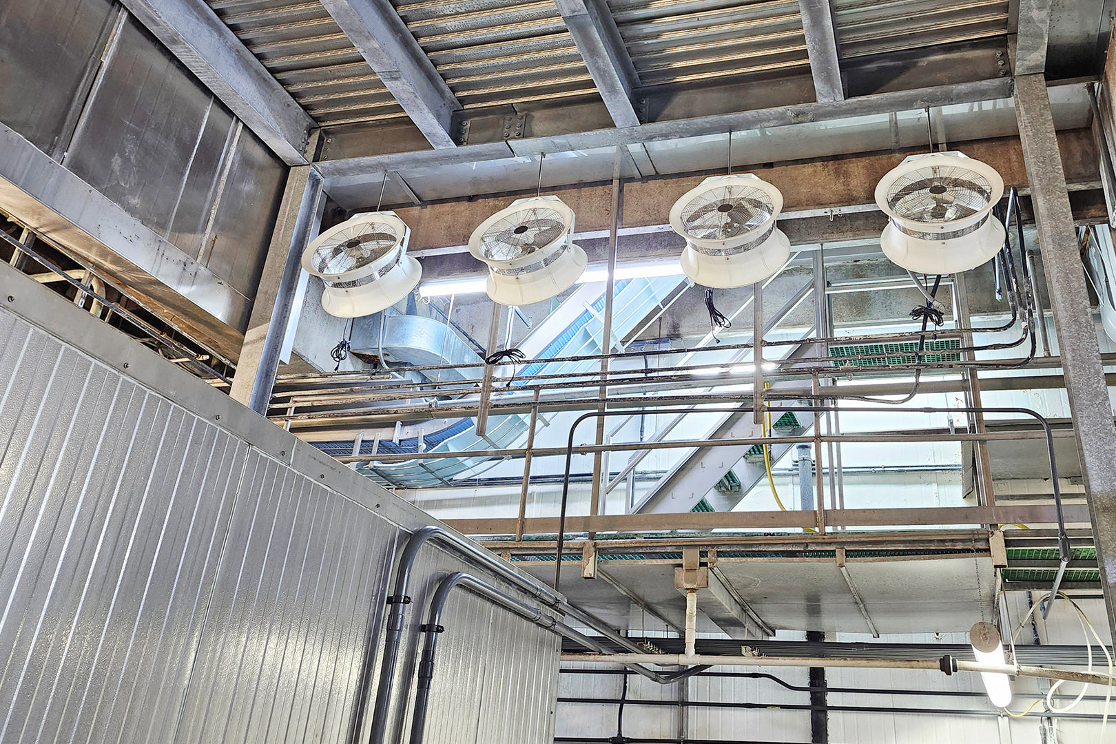 Inside food processing center with ventilation equipment, condensation, humidity, fans. Patterson.
