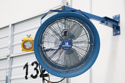 18-inch Patterson industrial wall-mounted fan on blue adjustable bracket