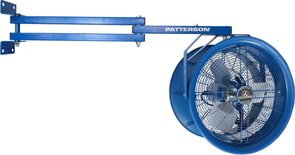 Patterson industrial fan mounted on extended dual-arm wall bracket