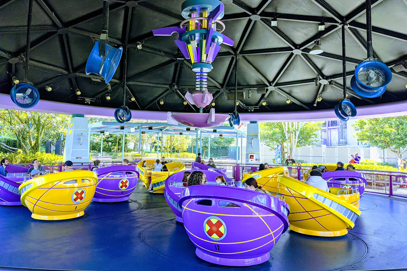 Patterson industrial fans mounted above a spinning theme park ride to provide cooling for guests